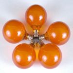 100 G40 Globe String Light Set with Orange Bulbs on Black Wire