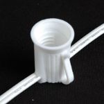 C9 25 Light String Set with Orange Bulbs on White Wire