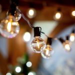 67 LED Filament G40 Globe String Light Set with Warm White Bulbs on Black Wire