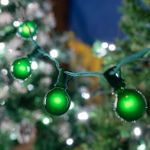 25 G40 Globe String Light Set with Green Satin Bulbs on Green Wire