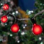 25 G40 Globe String Light Set with Red Satin Bulbs on Black Wire