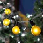 100 G40 Globe String Light Set with Yellow Bulbs on Black Wire