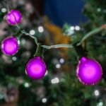 25 G40 Globe String Light Set with Purple Satin Bulbs on Green Wire