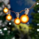 100 G40 Globe String Light Set with Yellow Bulbs on Brown Wire