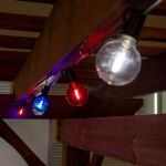 25 LED Filament G40 Globe String Light Set with Transparent Red, White & Blue Bulbs on Black Wire