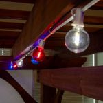 25 LED Filament G40 Globe String Light Set with Transparent Red, White & Blue Bulbs on White Wire